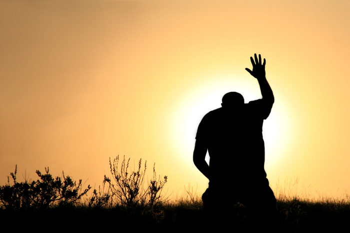 Silhouette of Man In Praise and Worship